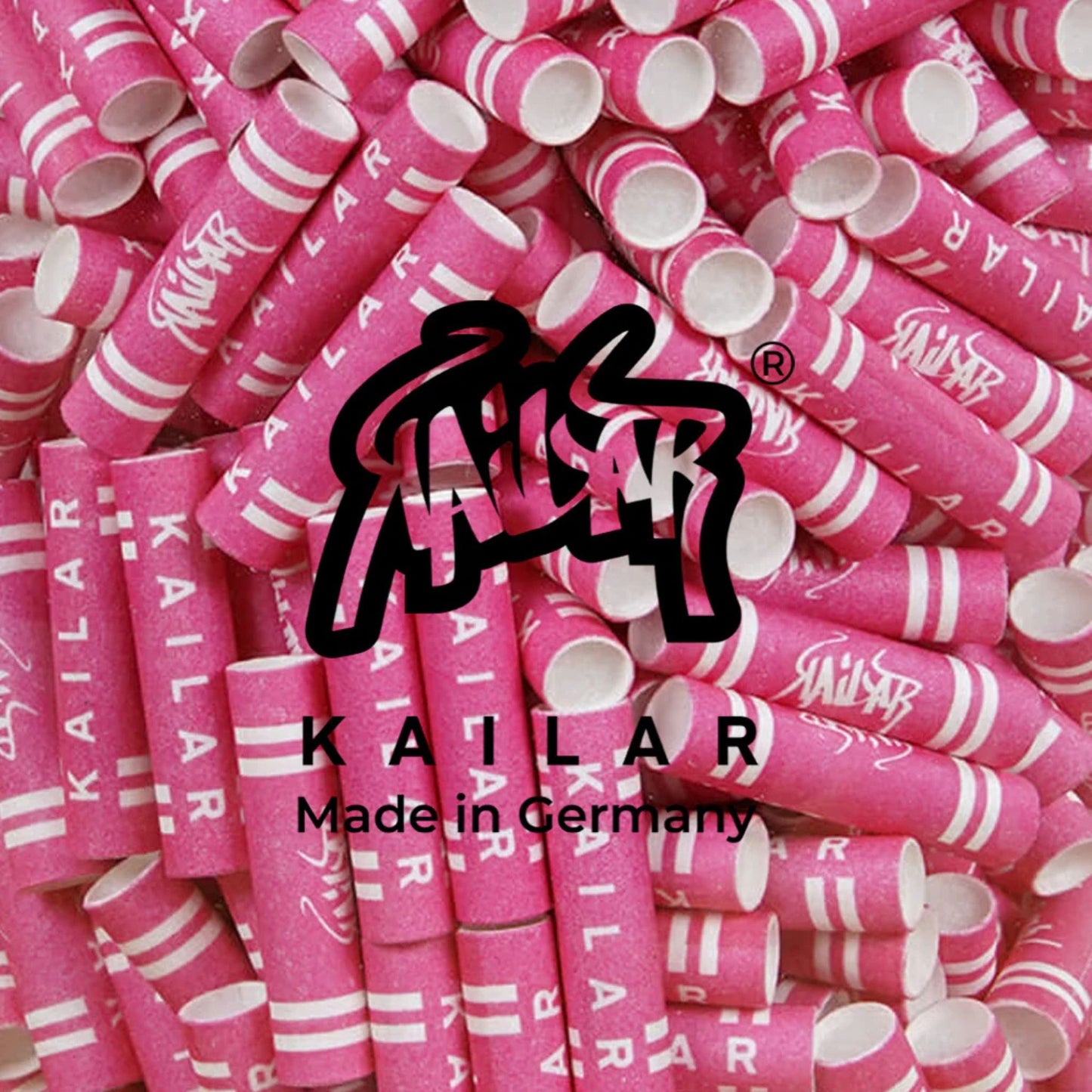 Viele pinkfarbene Kailar Aktivkohlefilter Slim Size (5,9mm) mit weißen Streifen und Logo, lose angeordnet, teilweise von oben fotografiert.