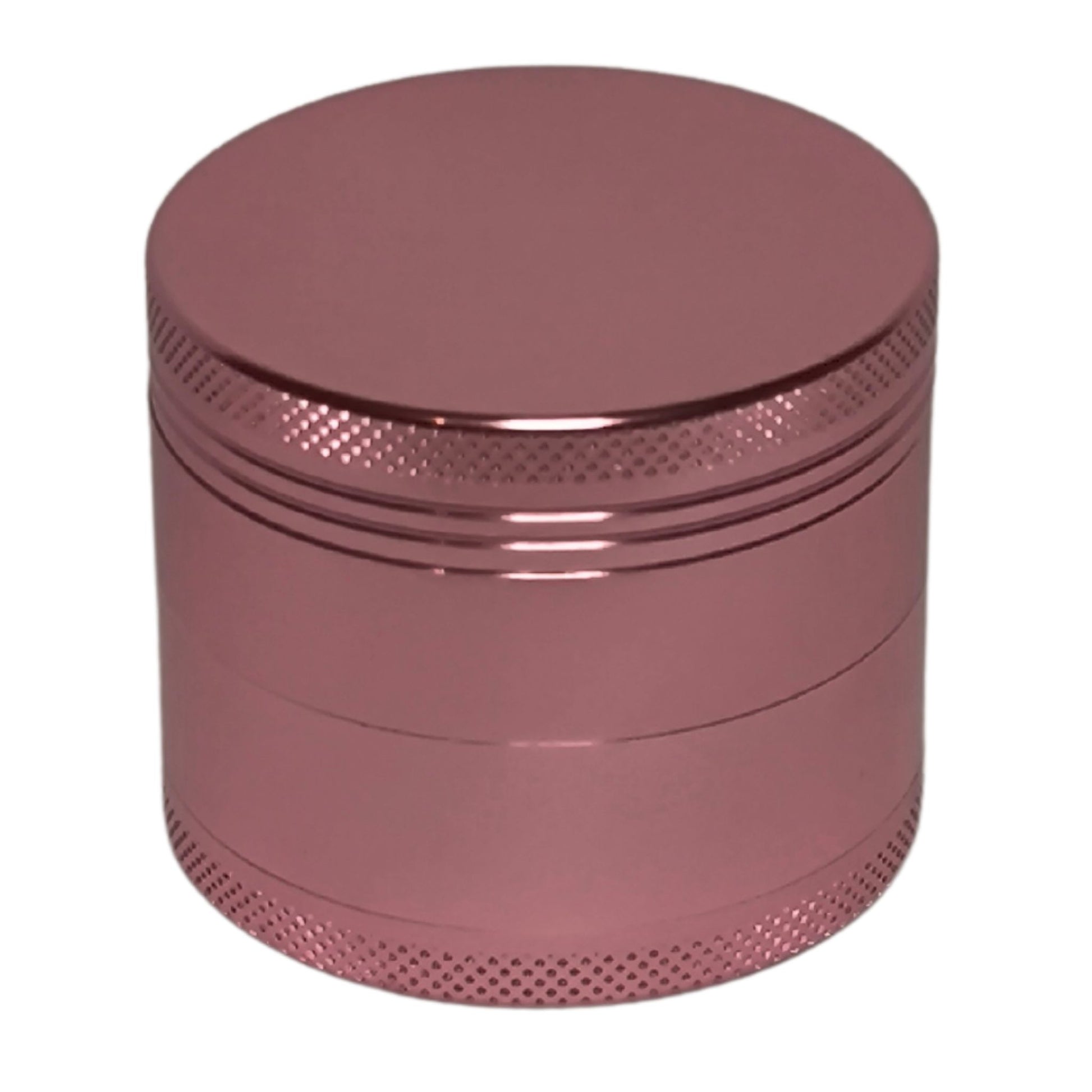 Geschlossener Aluminium Grinder (Roségold) mit 50 mm Durchmesser und 38 mm Höhe, elegantes, schlichtes Design mit griffiger Oberfläche.