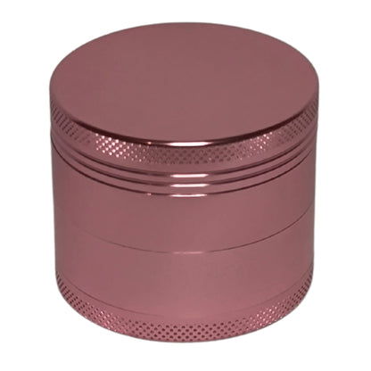 Geschlossener Aluminium Grinder (Roségold) mit 50 mm Durchmesser und 38 mm Höhe, elegantes, schlichtes Design mit griffiger Oberfläche.